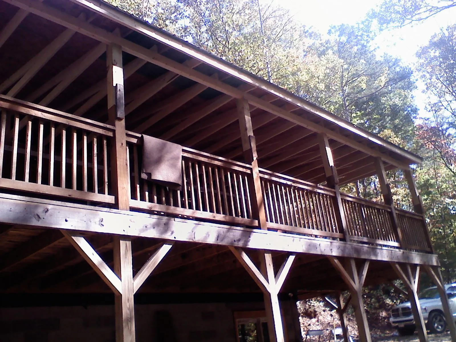 Timber framing under a new elevated porch and deck — Roof Leak Repair in Cabin John by Roofing Brothers